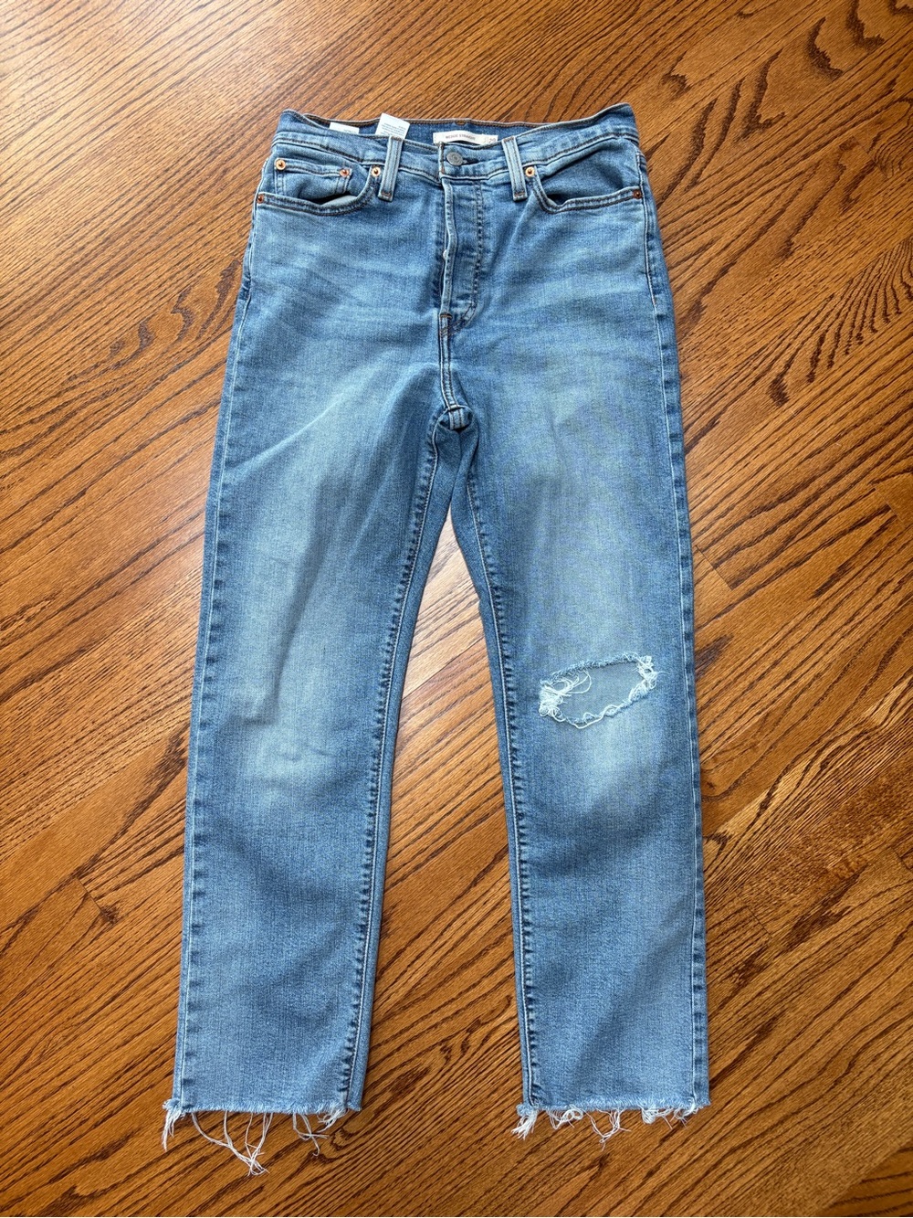 Levi's Women's Straight Leg Jeans in Light Blue with Frayed Hem Size 8